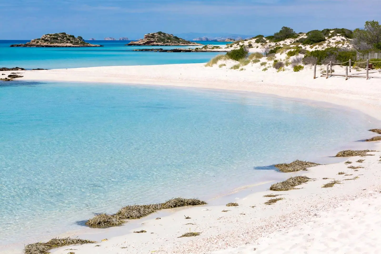 Ses Illetes beach in Formentera with turquoise shallow water