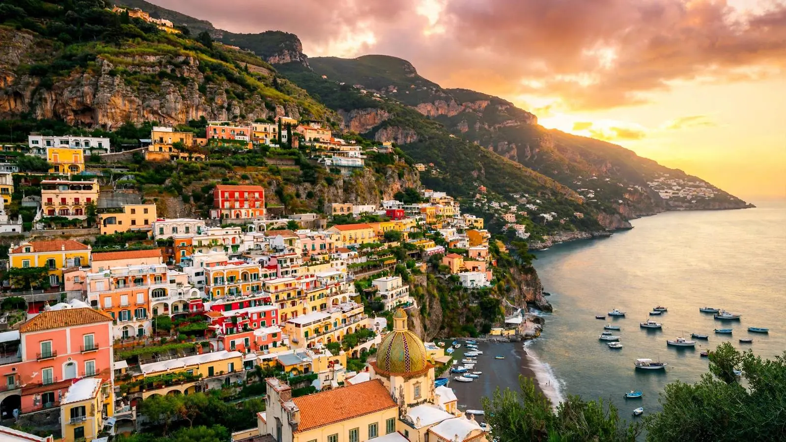 Positano colorful cliffside houses at sunset on the Amalfi Coast