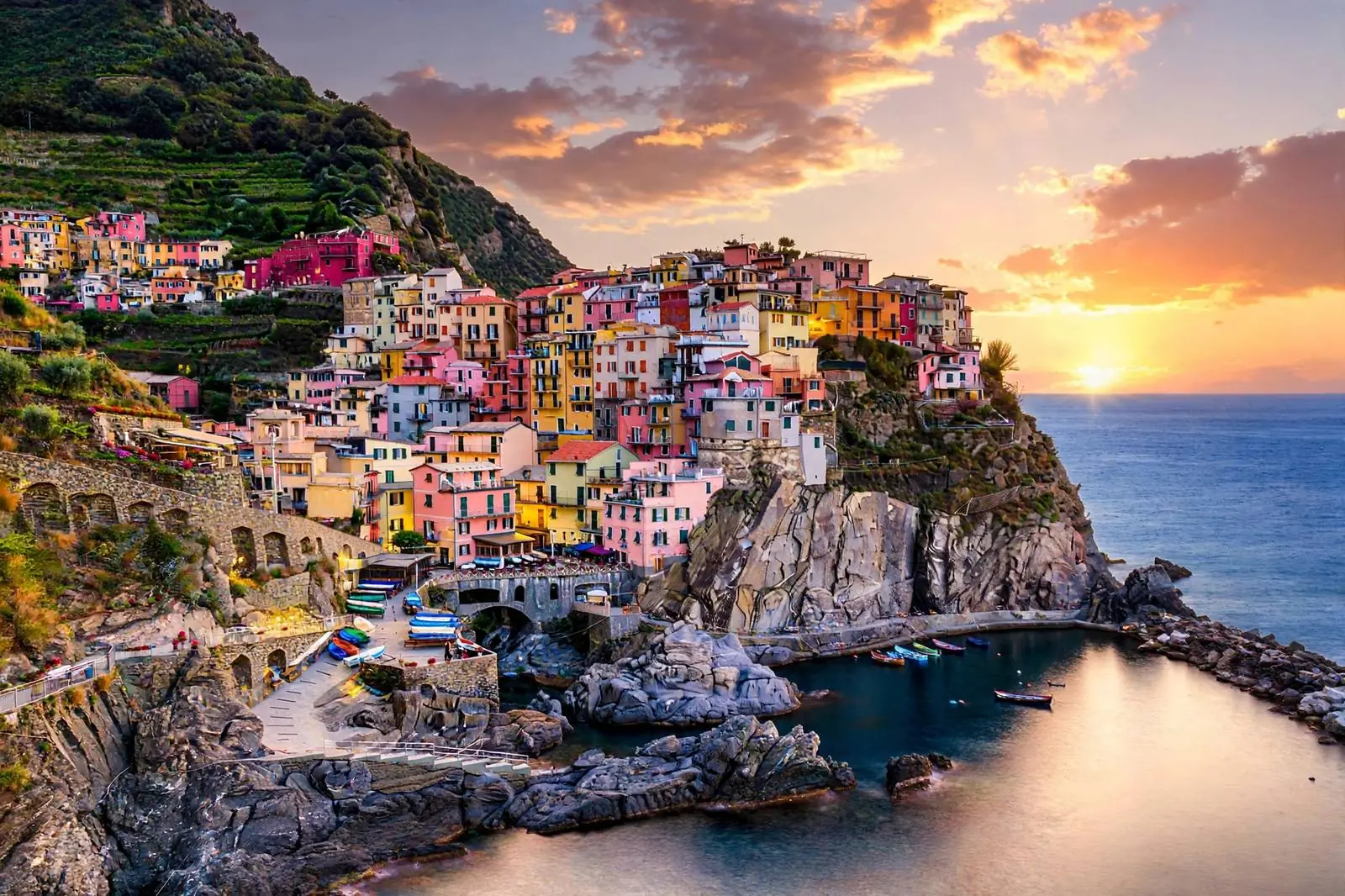 Colorful houses clinging to cliffs above the Tyrrhenian Sea