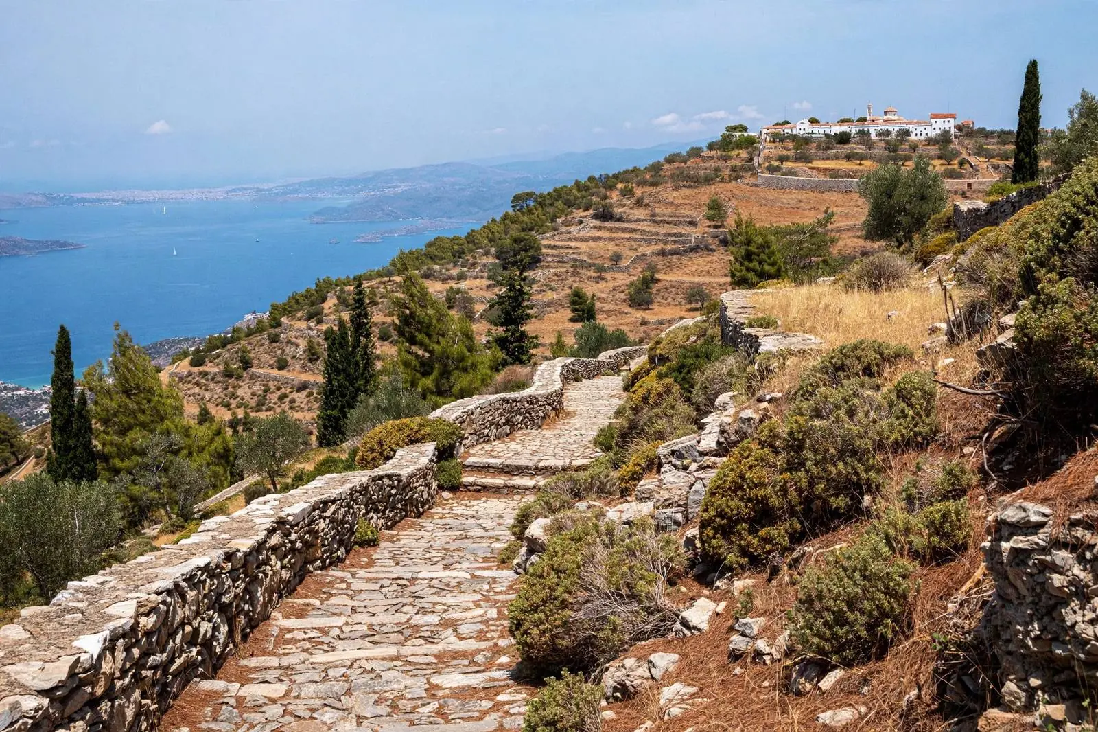Stone trail to a monastery above the sea on Hydra island, Greece